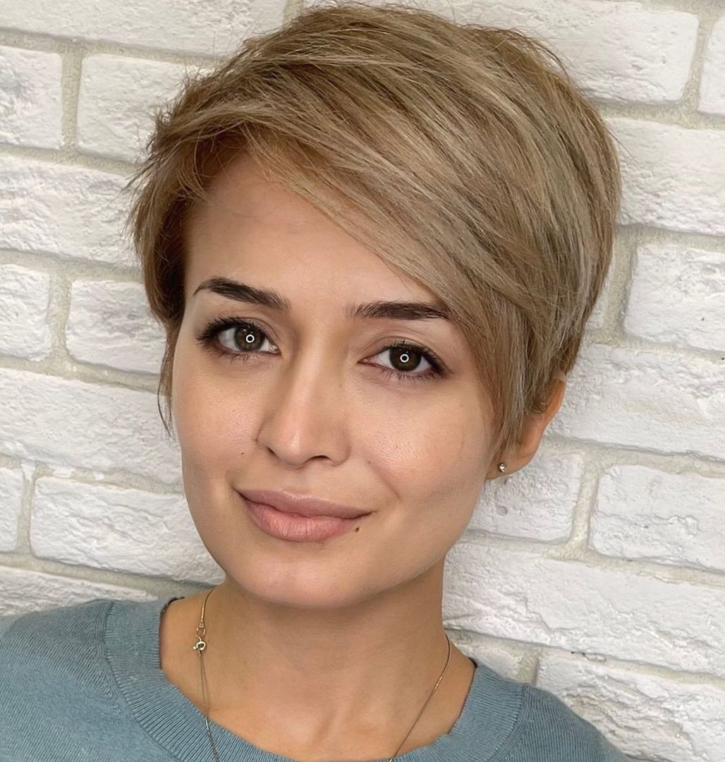 Short Feathered Ash Blonde Hairstyle