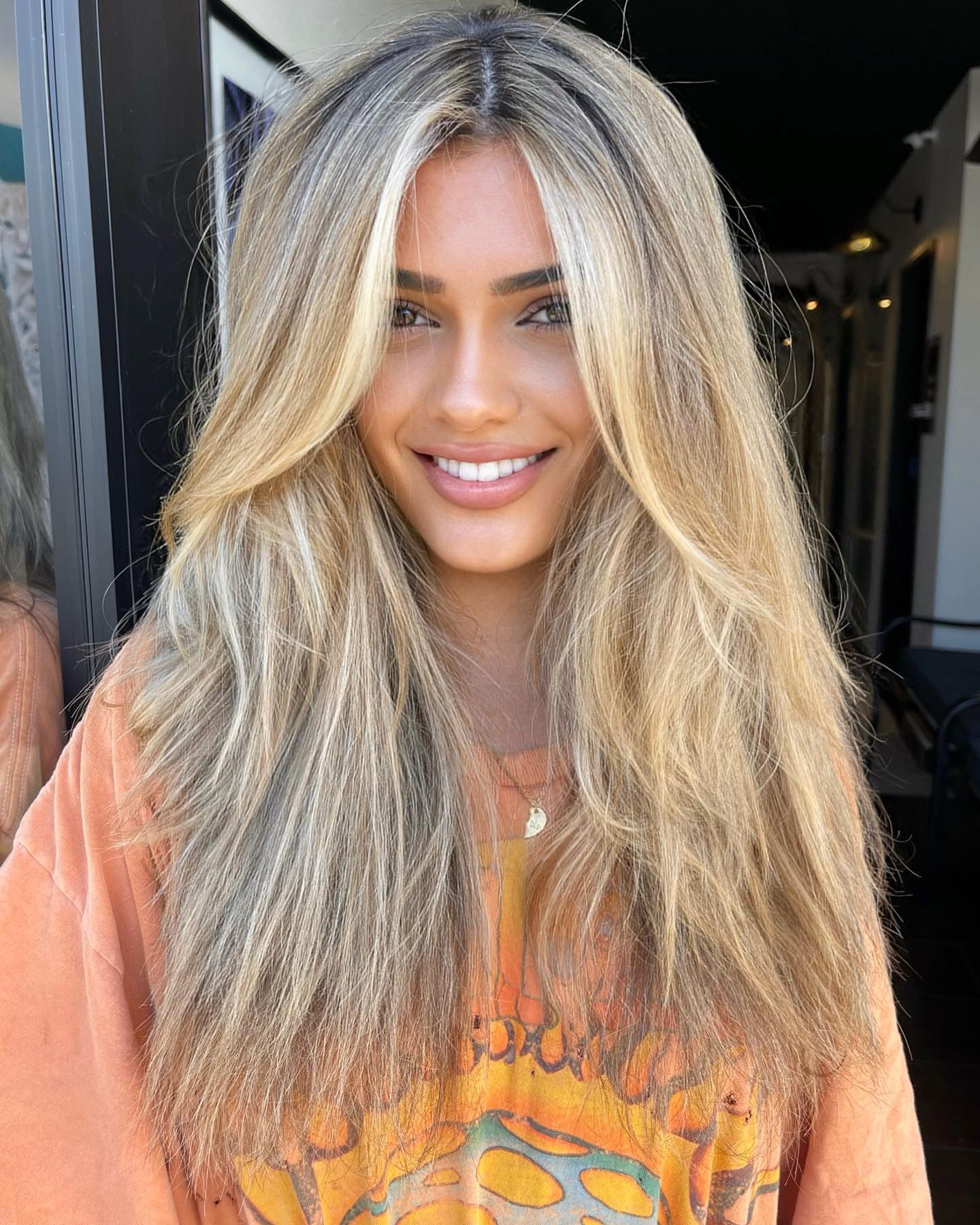 Long Wispy Layered Blonde Cut