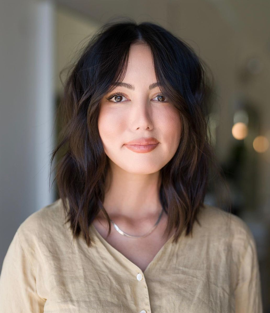 Collarbone Brunette Choppy Cut