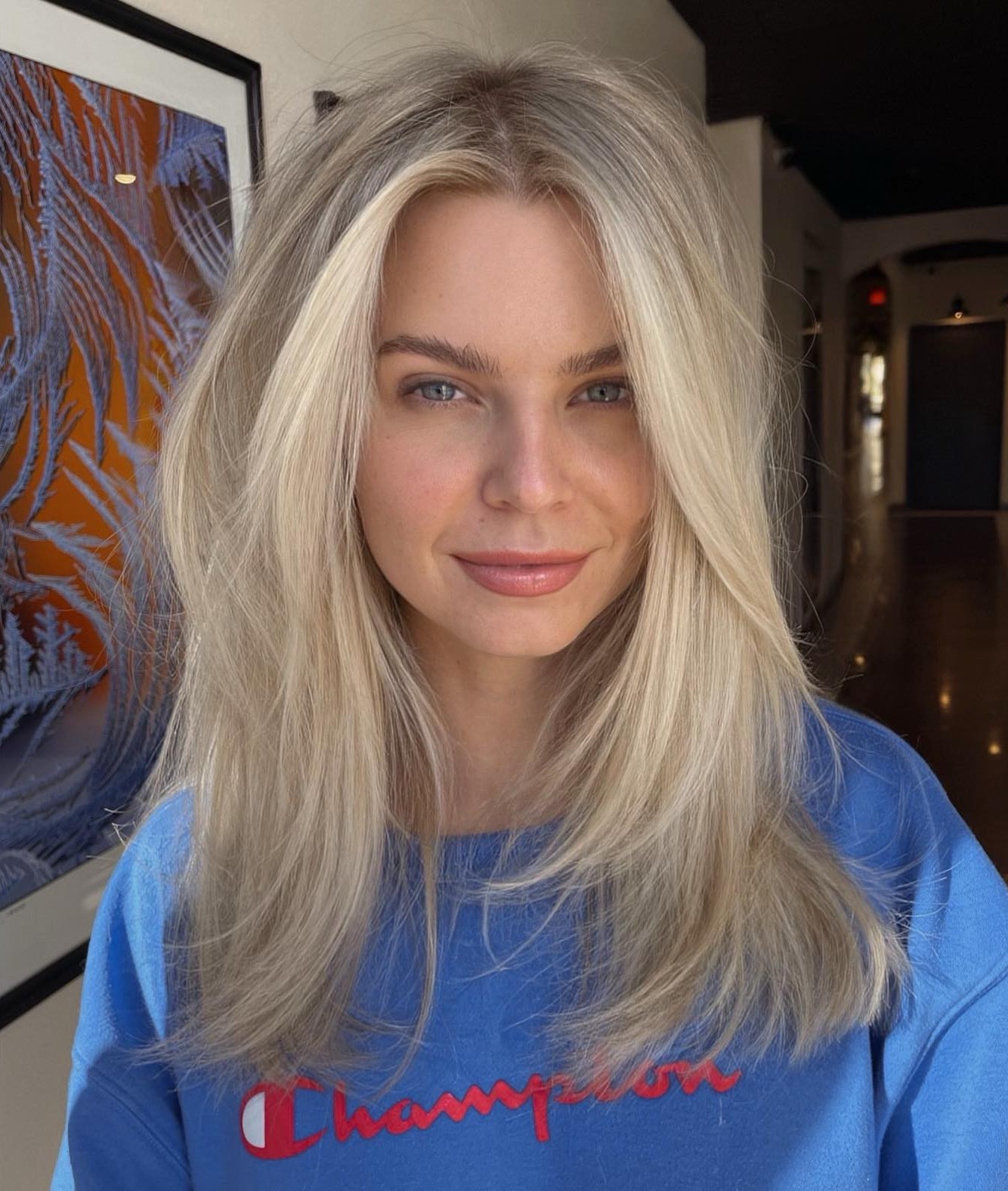 Armpit-Length Wispy Blonde Hairstyle