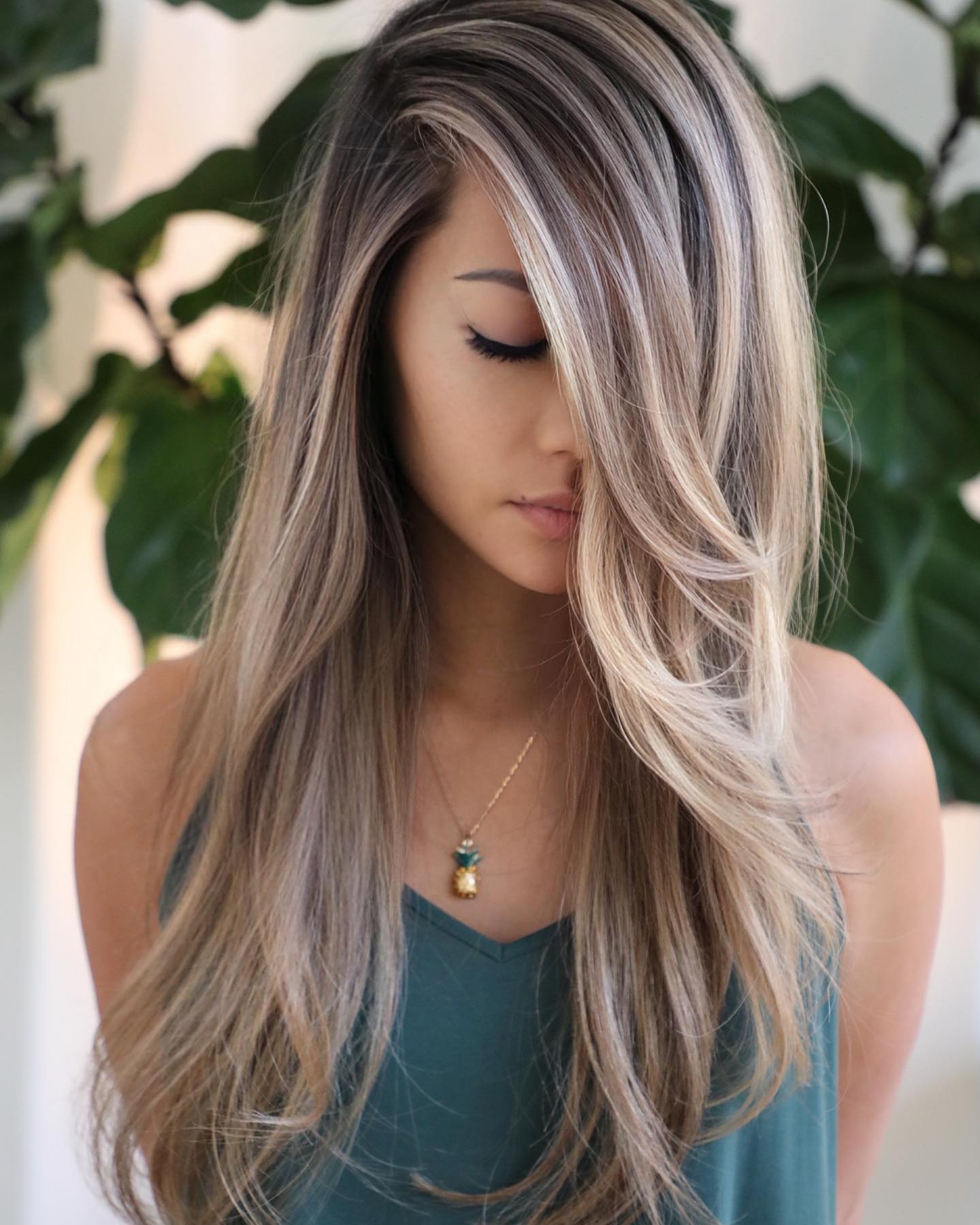 Long Layered Comb-Over Balayage Hairstyle